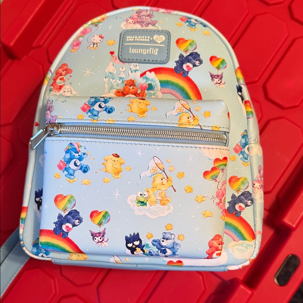 Loungefly Care Bears/Hello Kitty Light Blue Rainbow Mini Backpack